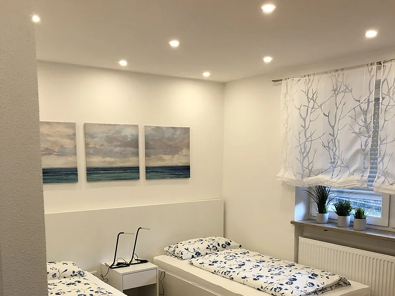 Ferienwohnungen Ferber 28 - Schlafzimmer mit zwei Einzelbetten
