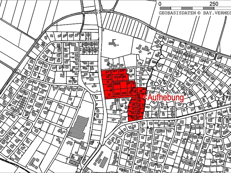Schwarz-weiße Stadtkarte mit markiertem roten Bereich und dem Wort „Aufhebung“ in der Mitte rechts.