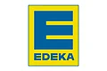 Logo von EDEKA mit großem blauen Buchstaben E auf gelbem Hintergrund und Schriftzug EDEKA darunter.
