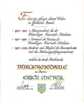 Urkunde der Stadt Monheim für über 35 Jahre öffentliches Wirken, Verleihung der Bürgermedaille an Erich Meyer aus dem Jahr 2006.