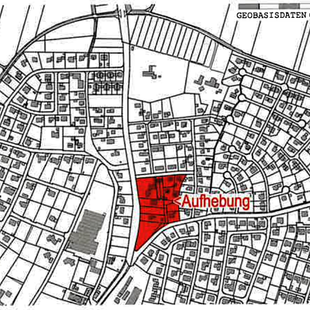 Schwarz-weiße Karte eines Wohngebiets mit einem rot markierten Bereich und dem Schriftzug „Aufhebung“.