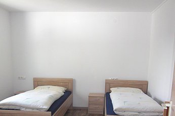 Ferienwohnung Ossiander Wittesheim - Schlafzimmer